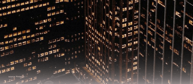 Lit skyscrapers at night symbolizing growth, modern investments, and evolving wealth strategies