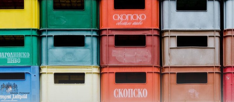 Stacked colorful crates symbolizing organized growth, inventory flow, and warehousing structure in India.