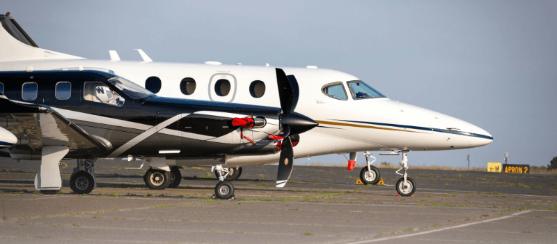 Luxury private jet on a runway, symbolizing high-level institutional strategies and global capital allocation.