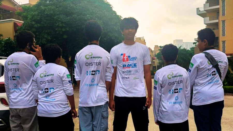 Tempest Racing high-school team in sponsor T-shirts, representing India’s next-gen F1 engineers.