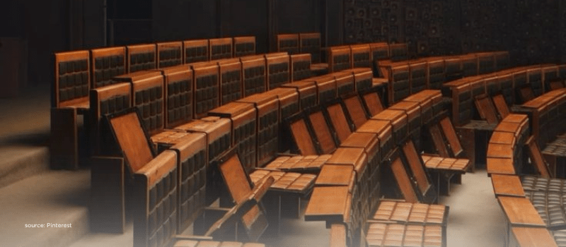 Tiered council seats symbolizing India’s rise as a global wealth hub
