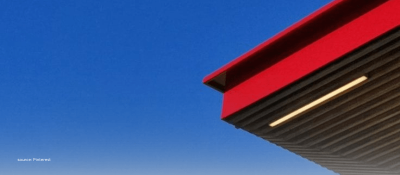 Clean red roofline against blue sky suggesting simpler LVF rules lower minimums and clearer access for insurers and pensions.