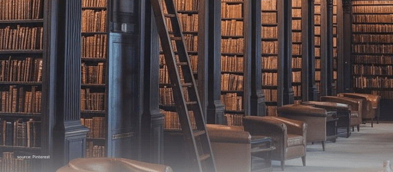 Tall library stacks with a ladder, signalling research-backed ways secondaries ease commitments.