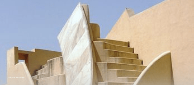 Geometric sandstone steps suggesting India’s layered, rising consumer economy
