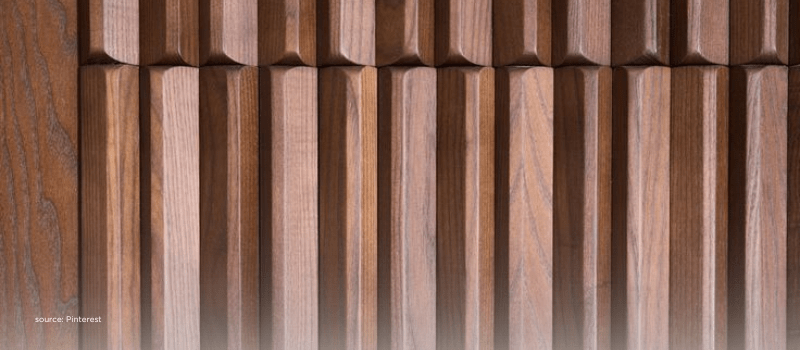 Close-up of rising wooden ridges evoking global secondaries growth and structure.
