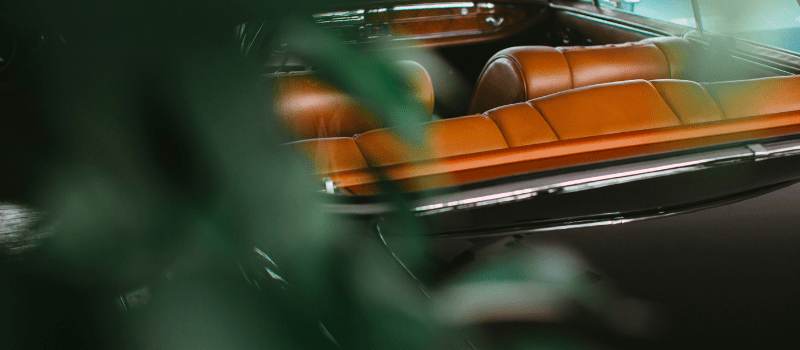 Car interior close-up symbolising DPI as realised cash comfort beyond paper returns