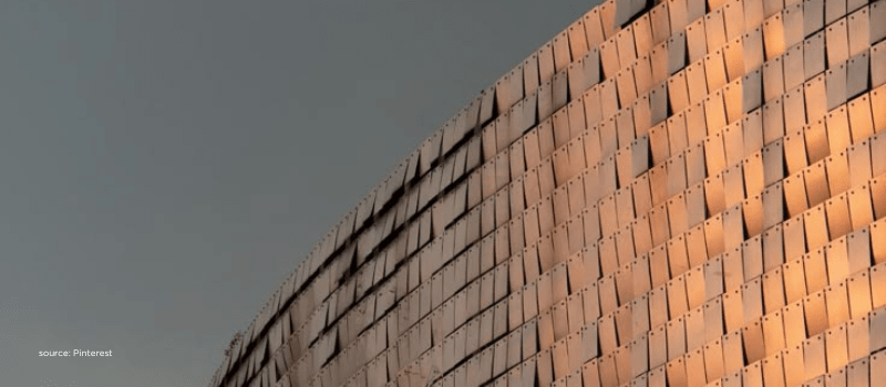 Sunlit building facade represents the AI infrastructure buildout beyond the app layer