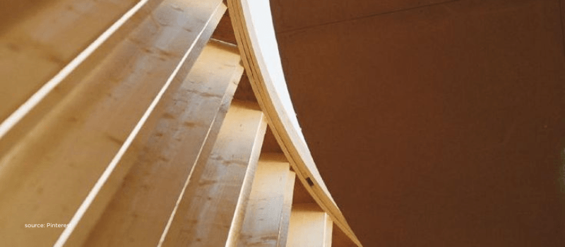 Curved wooden architecture reflecting private equity’s maturing discipline