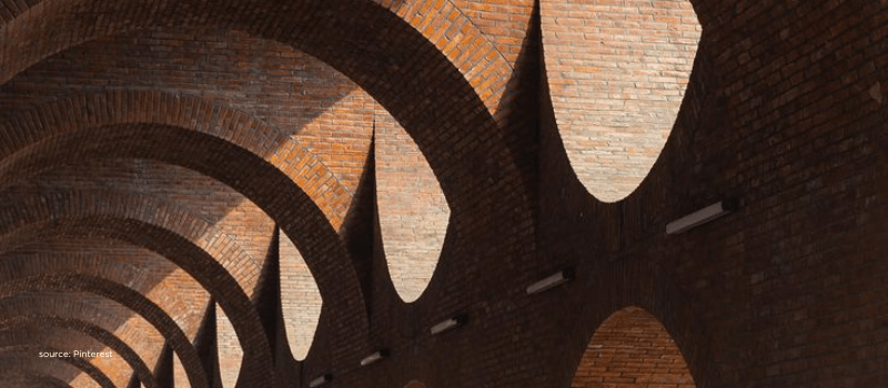 Repeating brick arches, reflecting layers of access and concentrated digital spending.