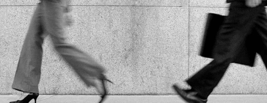Two professionals walking briskly, representing accountability in Indian venture capital.
