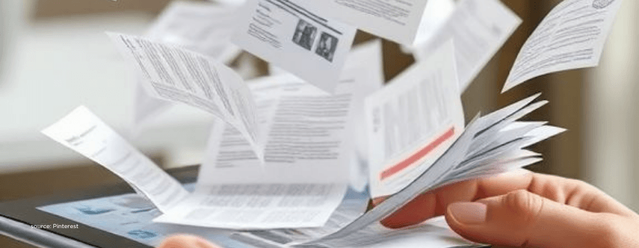 Documents and paperwork scattered mid-air, symbolizing new MSME compliance rules