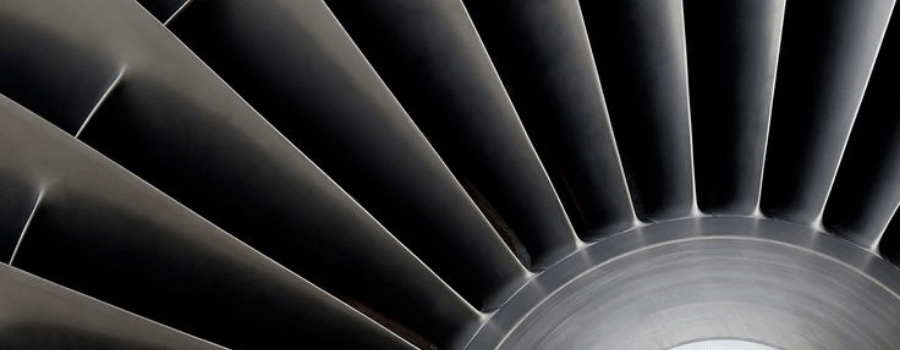 Close up of turbine blades in motion, representing the flywheel of recycled startup capital