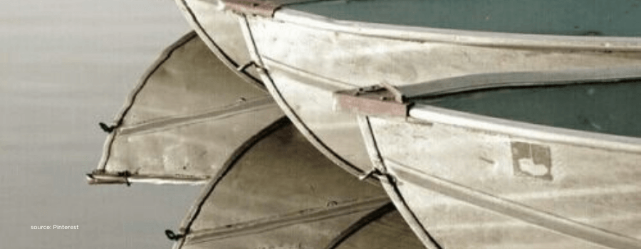 Boats moored at dock, symbolising multiple exit routes for private market liquidity